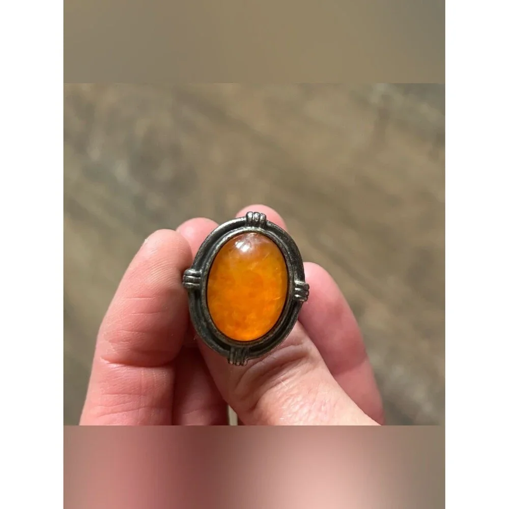 Untested women’s size 13.5 metal butterscotch amber or orange spiny oyster ring
